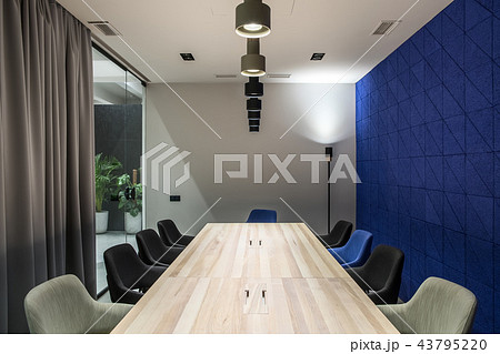 Stylish conference room with gray and blue walls Stylish conference room with gray and blue walls 43795220