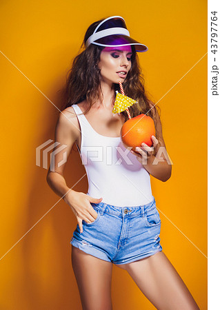 Sensual woman with juicy fruit 43797764