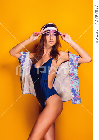 Woman in cap and swimwear Woman in cap and swimwear 43797857