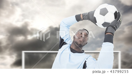 Soccer goalkeeper saving football in goal 43799255