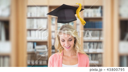 Student woman in education library with graduation hat 43800795