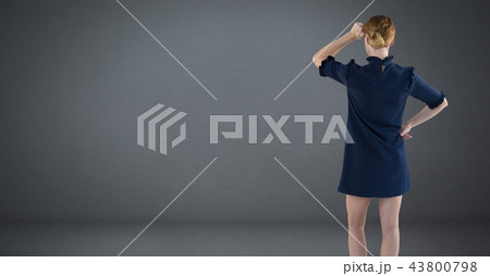 Businesswoman looking at wall 43800798