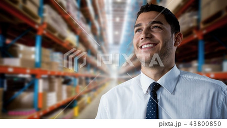 Businessman smiling successfully in warehouse perspective 43800850