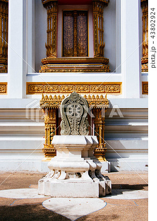 boundary marker of a temple outside the church. 43802924