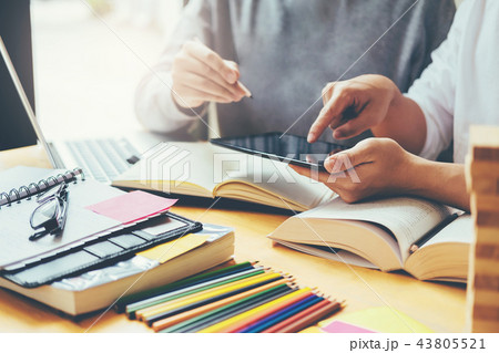 High school or college students studying and readi 43805521