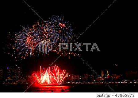 Many flashing fireworks with night cityscape background celebrat Many flashing fireworks with night cityscape background celebrat 43805975
