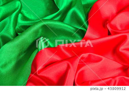 Natural red and green satin fabric texture 43809912
