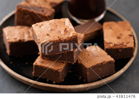 Double Chocolate Brownies. Homemade chocolate fudge brownies with chocolate chips and black Double Chocolate Brownies. Homemade chocolate fudge brownies with chocolate chips and black 43811476