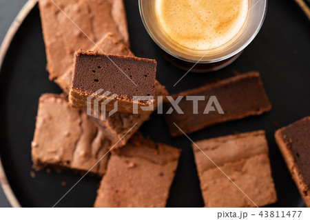 Double Chocolate Brownies. Homemade chocolate fudge brownies with chocolate chips and black Double Chocolate Brownies. Homemade chocolate fudge brownies with chocolate chips and black 43811477