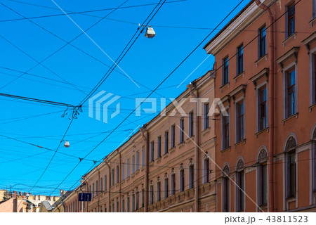 Electrical wires and cables over urban downtown 43811523