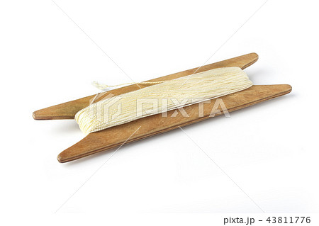 Wooden coil with nylon cord Wooden coil with nylon cord 43811776