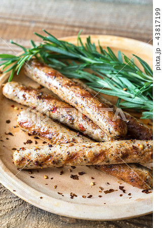 Grilled sausages with rosemary 43817199