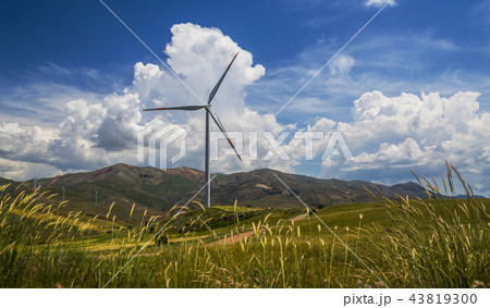 Wind power station among rural landscape Wind power station among rural landscape 43819300