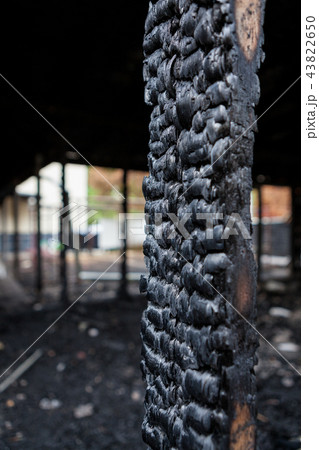 Burnt broken wood wall 43822650