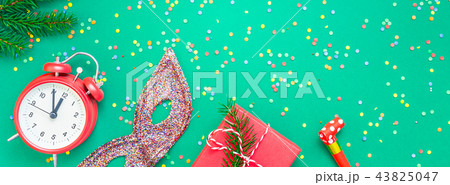 Christmas pattern flat lay with red alarm clock Christmas pattern flat lay with red alarm clock 43825047