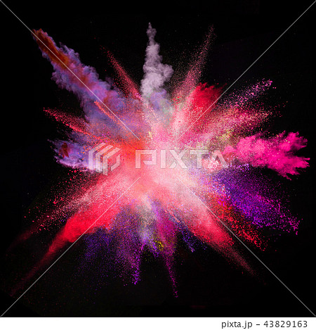 Colored powder explosion on black background. 43829163