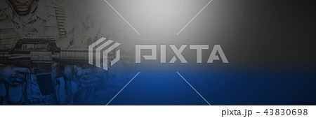 Portrait of confident military soldier holding rifle 43830698