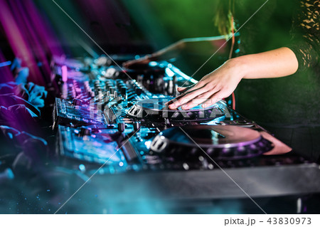 Dj mixes the track in the nightclub at a party 43830973