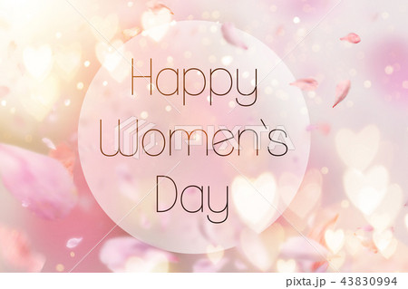 Abstract composition for Women's Day. Pink flower petals flying with hearts symbols. 43830994