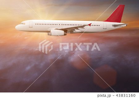 Commercial airplane flying above clouds. Commercial airplane flying above clouds. 43831160