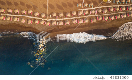 Perissa beach during sunrise on the Greek island of Santorini. 43831300