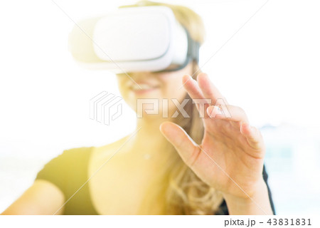 woman wearing VR glasses Selective focus 43831831