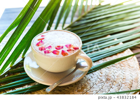 Cup pink cappuccino foam decorated rose petals Cup pink cappuccino foam decorated rose petals 43832184