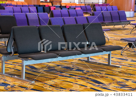 A row of chair at the lobby of airport 43833411