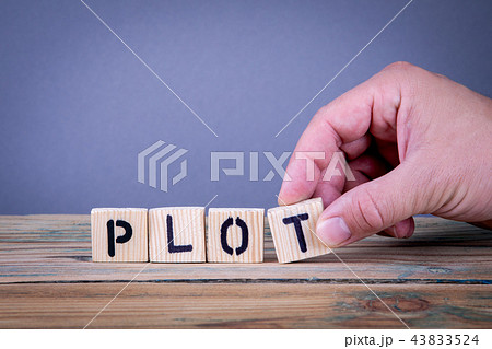plot. Wooden letters on the office desk 43833524