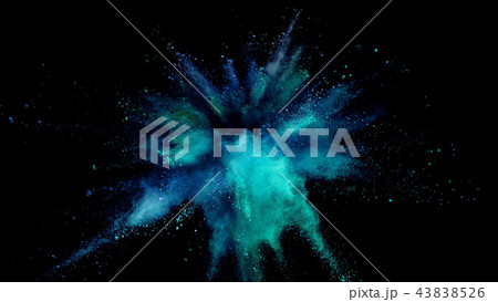 Explosion of coloured powder on black background. 43838526
