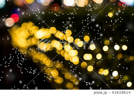 Colorful orange bokeh with snow background Colorful orange bokeh with snow background 43839614