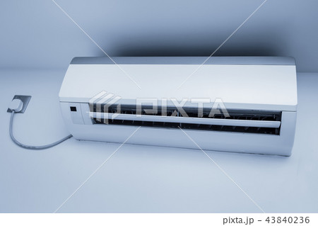 Split-system air conditioner on wall Split-system air conditioner on wall 43840236