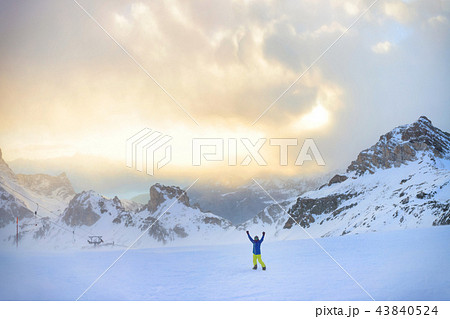 Winter snowboarding activity in high Italian Alps 43840524