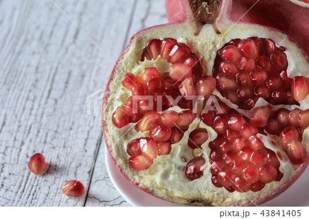Pomegranate on a plate 43841405
