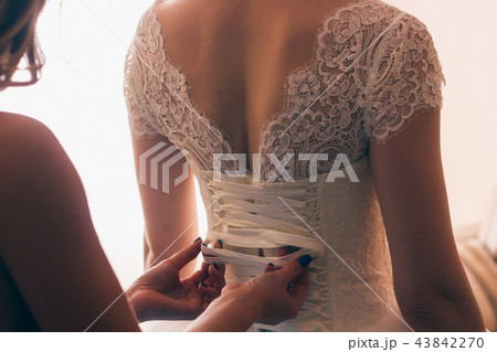 lace wedding dress back of a young bride lace wedding dress back of a young bride 43842270