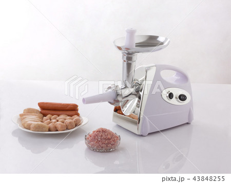 Homemade sausage machine with sausages isolated 43848255