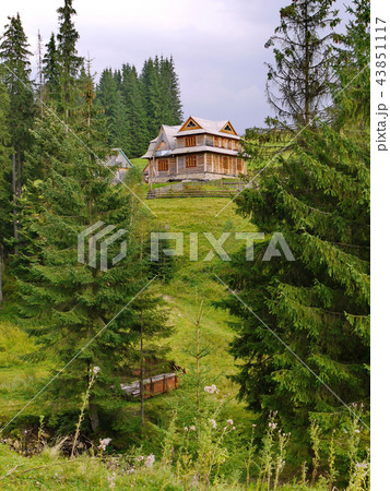 rural wooden house in 2 floors on the slope betwee 43851117