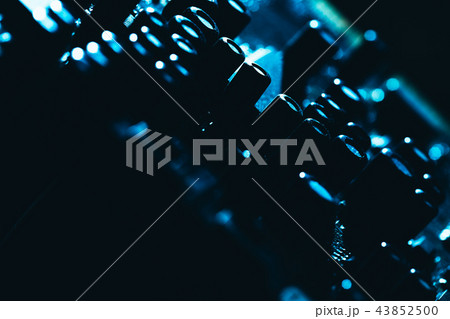 computer motherboard in blue dark background close 43852500