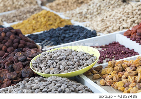 Dried fruits and nuts on local food market 43853488