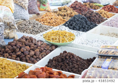 Dried fruits and nuts on local food market Dried fruits and nuts on local food market 43853492