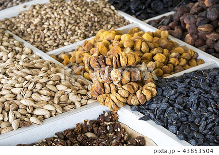 Dried fruits and nuts on local food market 43853504