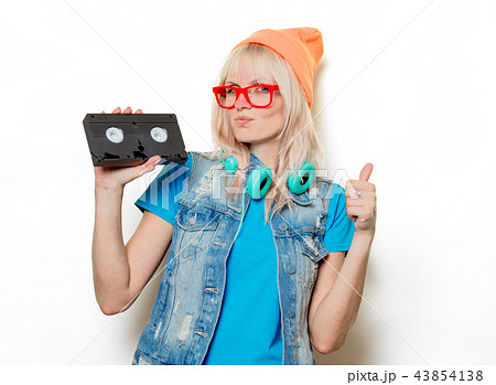 adult girl orange hat with VHS 43854138