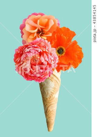 Ice cream cone with three crepe paper flowers Ice cream cone with three crepe paper flowers 43854145