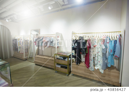 Fashion Design Clothes on Display rack in retail Fashion Design Clothes on Display rack in retail 43856427