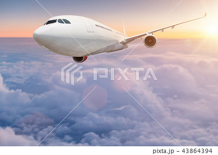 Commercial airplane flying above clouds. Commercial airplane flying above clouds. 43864394