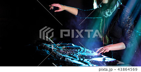 Dj mixes the track in the nightclub at a party 43864569