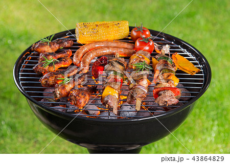 Barbecue grill with tasty meat, close-up. Barbecue grill with tasty meat, close-up. 43864829