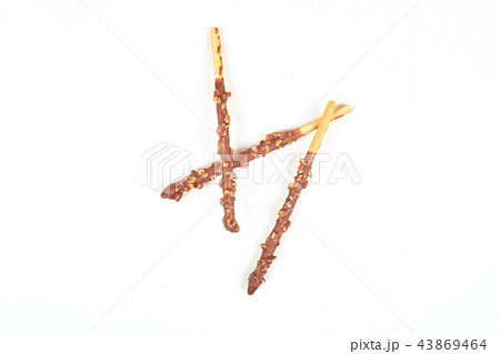 Biscuit stick with chocolate and almond isolated on white background. 43869464