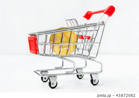 Shopping cart with Bitcoin coin Shopping cart with Bitcoin coin 43872082