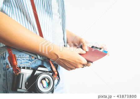 Travel cost, Thai woman hand holding passport 43873800